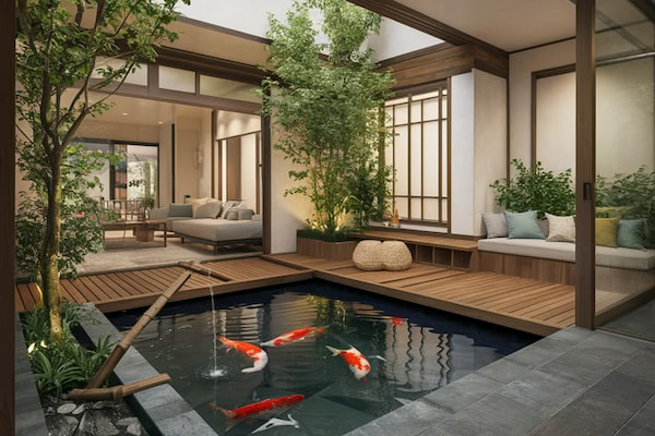 Sân vườn Nhật Bản sử dụng các yếu tố như đá, sỏi, cát, cây bonsai, hồ cá koi